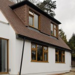 remodeled to recreate original with increased dormer and window sizes